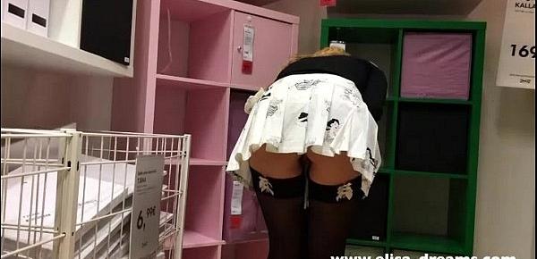  Upskirt and flashing no panties in a famous shop
